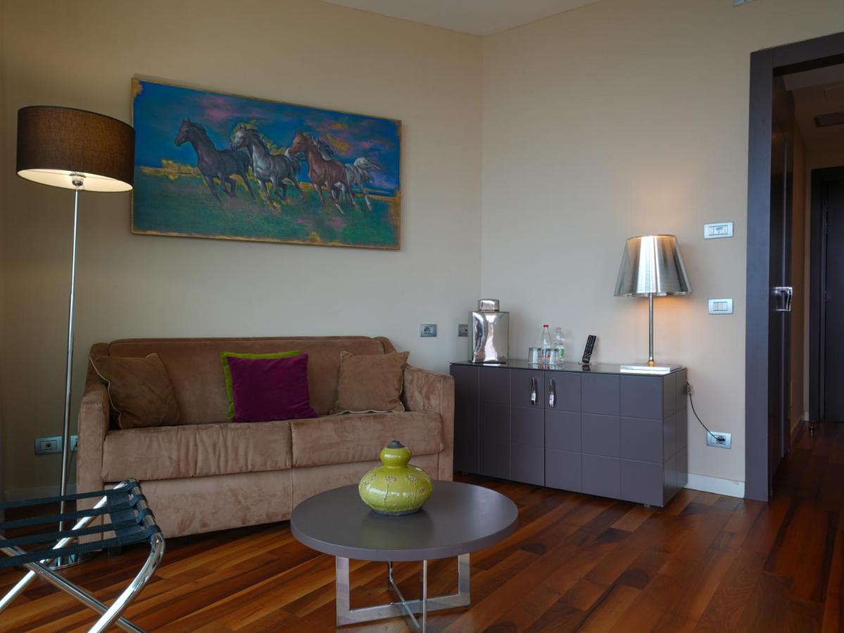 ホテル Pisa Tower Plaza エクステリア 写真 A living room in a hotel